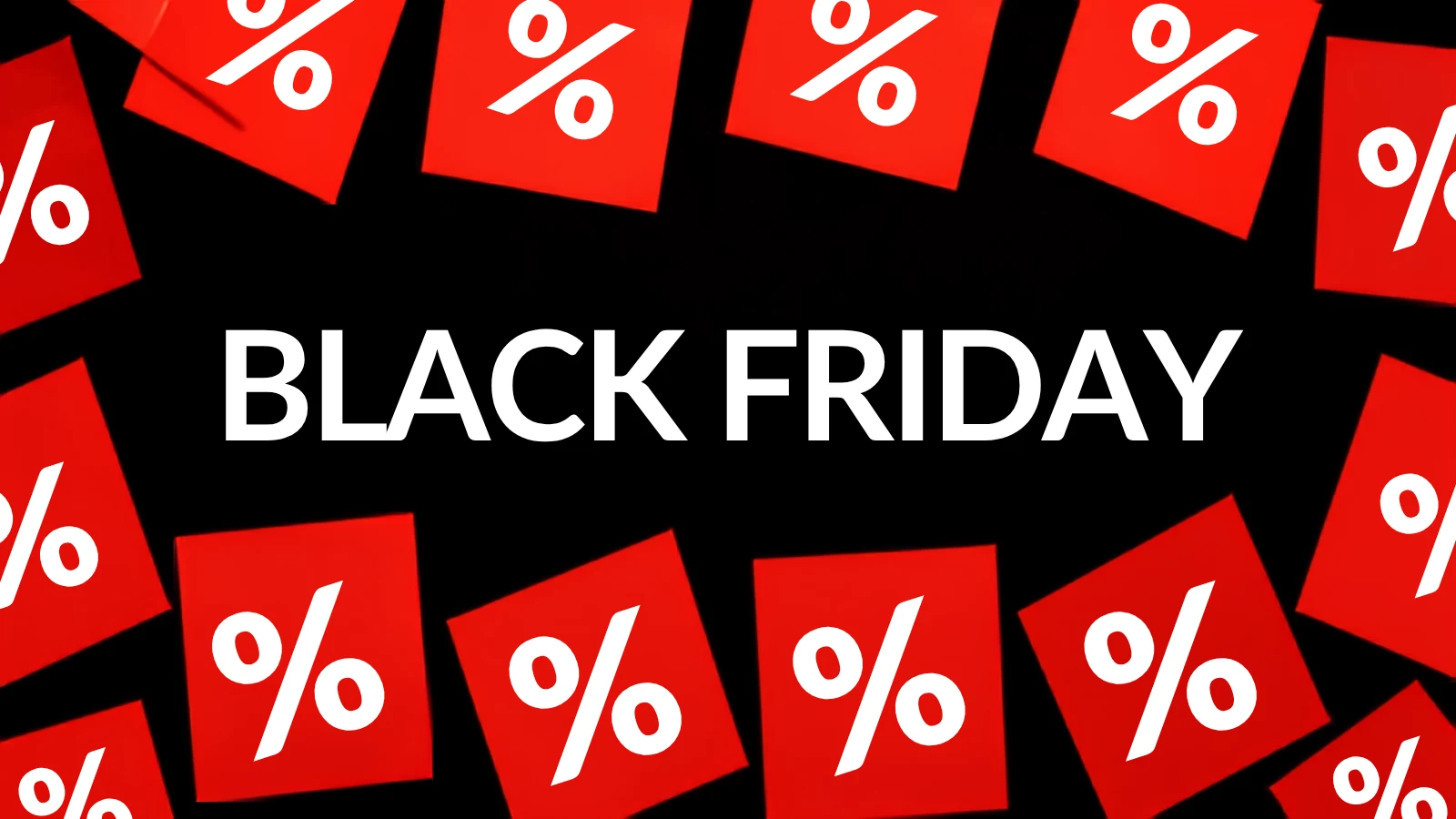 A expressão Black Friday em letras brancas sobre fundo preto, cercada por etiquetas vermelhas com o símbolo de porcentagem